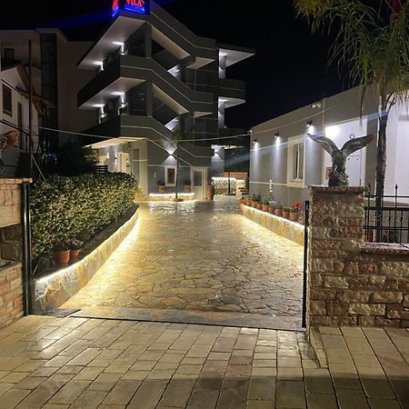 Vila La Familia Ксамил Экстерьер фото
