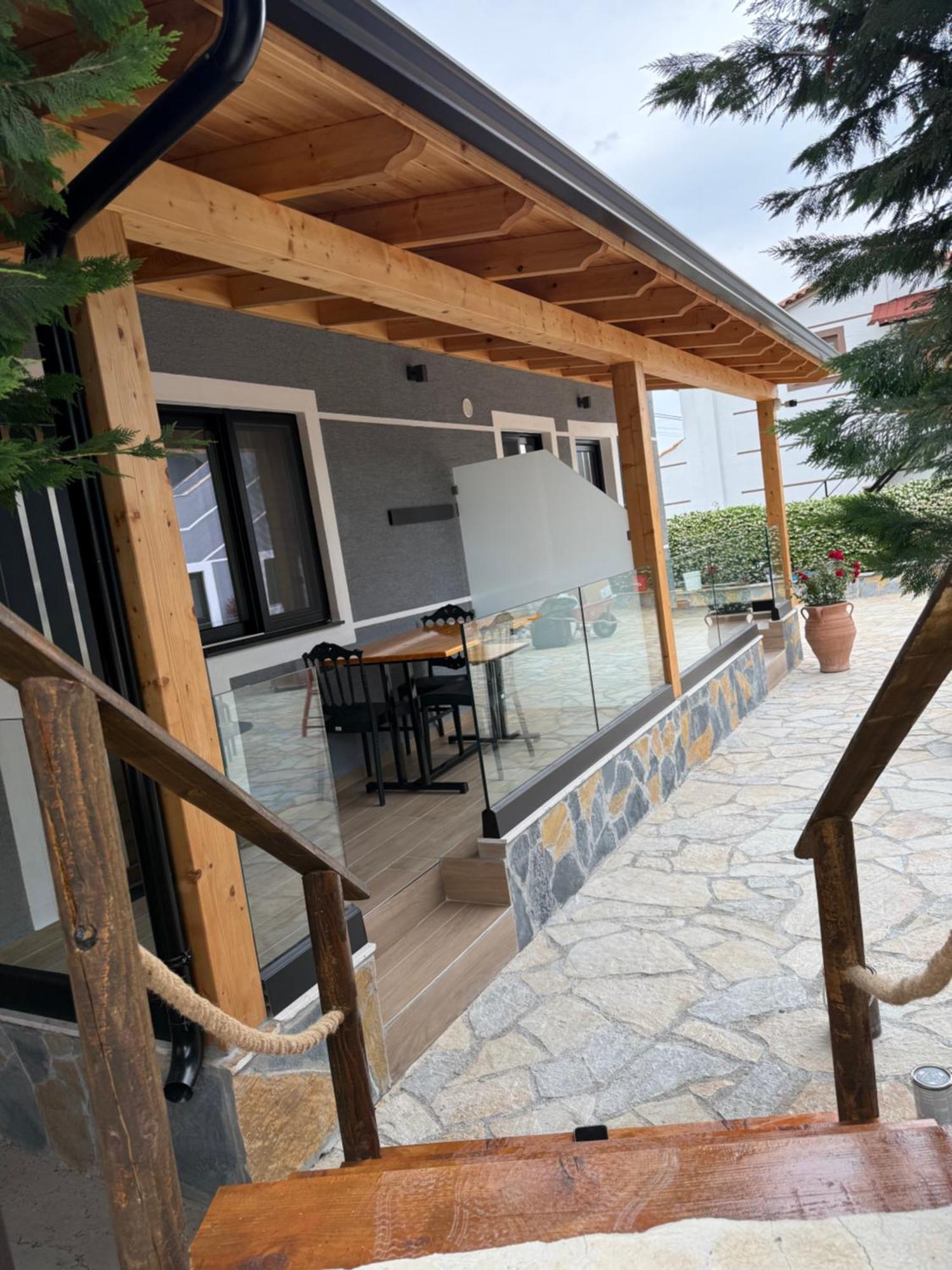Vila La Familia Ксамил Экстерьер фото